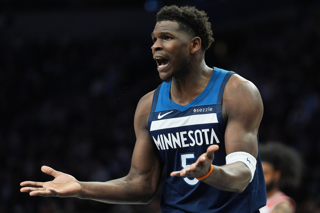 Minnesota Timberwolves guard Anthony Edwards reacts toward a referee during the first half of an NBA basketball game against the Chicago Bulls, Thursday, Jan. 22, 2026, in Minneapolis. (AP Photo/Abbie Parr)