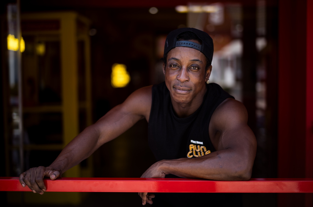 Shaka Smith, a vegan influencer who's politically an independent, poses for a portrait at his fast-food restaurant in Santa Monica, Calif., Thursday, Aug. 6, 2026. (AP Photo/Jae C. Hong)