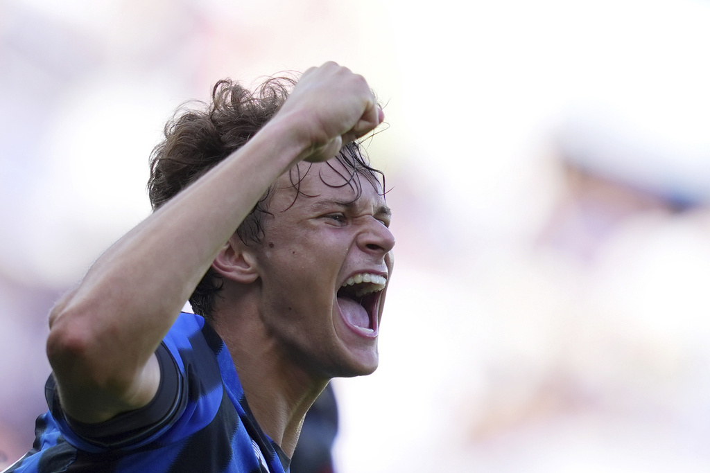 Atalanta's Giorgio Scalvini celebrates after scoring his side's opening goal during the Serie A soccer match between Atalanta and Lecce at the New Balance Stadium in Bergamo, Italy, Sunday, Sept. 14, 2025. (Spada/LaPresse via AP)