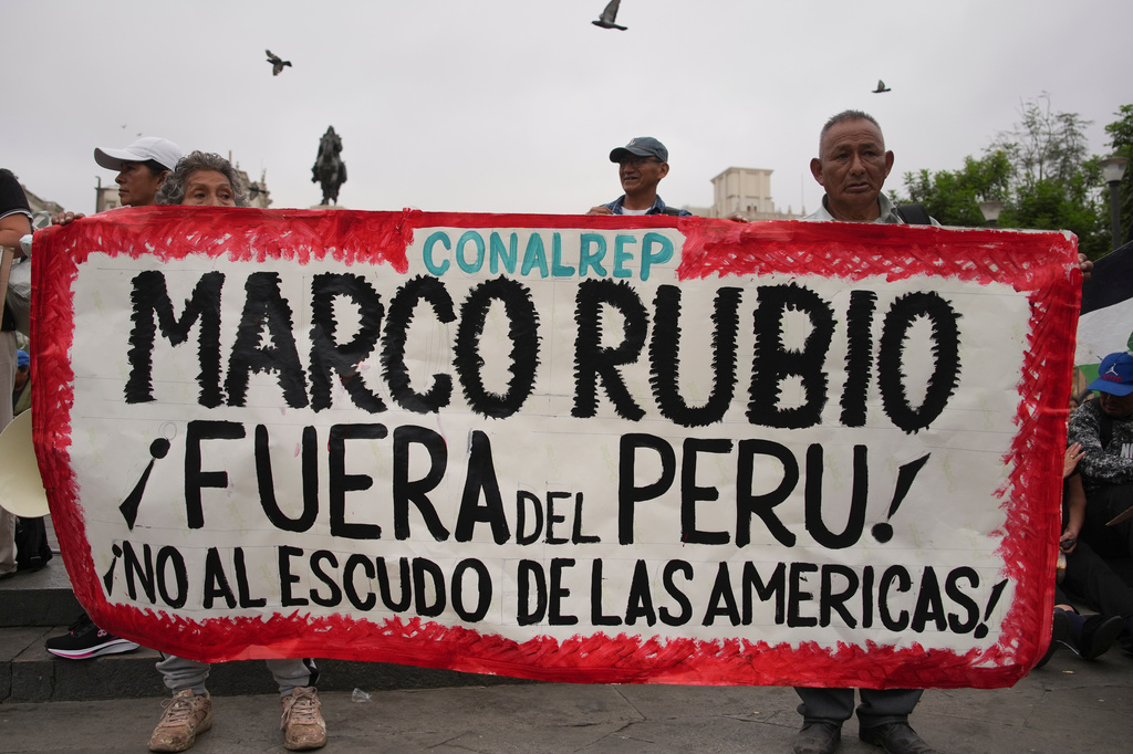 People protest the visit of U.S. Sec. of State Marco Rubio in Lima, Peru, Wednesday, Sept. 9, 2026. (AP Photo/Guadalupe Pardo)