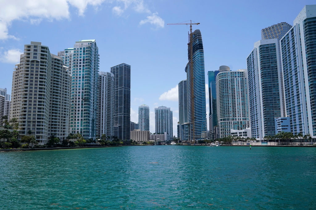 FILE - High-rise buildings at the mouth of the Miami River are seen from Biscayne Bay, May 9, 2022, in Miami. (AP Photo/Lynne Sladky, File)