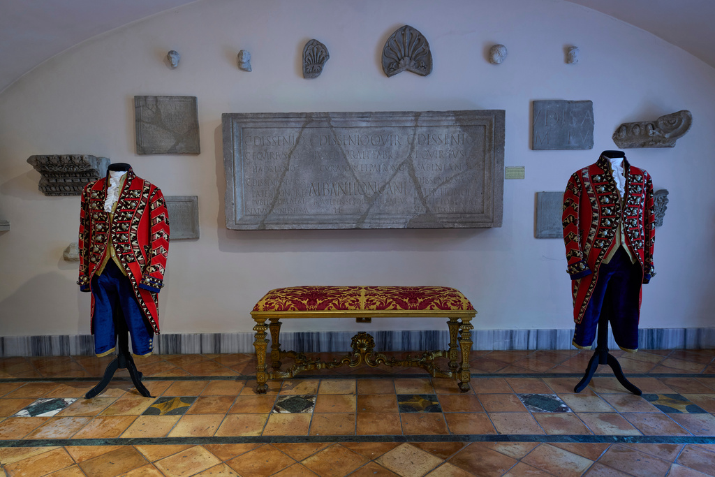 Ceremonial uniforms worn by palace staff are displayed in the prince's apartments at Palazzo Colonna, or the Colonna Palace, in Rome during a media tour, Friday, Nov. 7, 2025. (AP Photo/Domenico Stinellis)