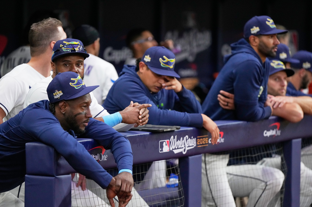 Members of the Tampa Bay Rays watch during the seventh inning of Game 3 of baseball's World Series, Monday, Oct. 26, 2026, in St. Petersburg, Fla., between the Milwaukee Brewers and the Tampa Bay Rays. (AP Photo/Ashley Landis)