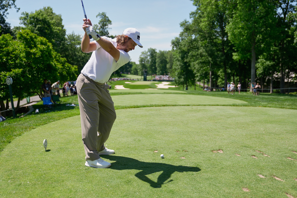 Tommy Fleetwood, of England, hits from the eighth tee during the first round of the Memorial golf tournament in Dublin, Ohio, Thursday, June 4, 2026. (AP Photo/Sue Ogrocki)