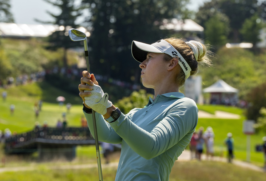 Nelly Korda of the United States watches her tee shot on the 14th hole during the second round of the Canadian Women's Open at Mississauga Golf and Country Club in Mississauga, Ontario, Friday, Aug. 22, 2025. (Frank Gunn/The Canadian Press via AP)