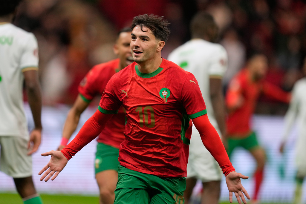 Morocco's Brahim Abdelkader Díaz celebrates after scoring during the Africa Cup of Nations group A soccer match between Morocco and Comoros in Rabat, Morocco, Sunday, Dec. 21, 2025. (AP Photo/Mosa'ab Elshamy)