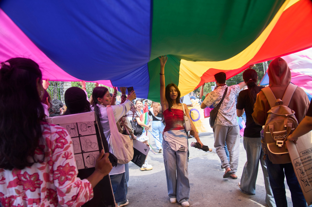 Members and supporters of the LGBTQ+ community participate in a Pride Month rally in Kathmandu, Nepal, on Saturday, June 13, 2026. (AP Photo/Niranjan Shrestha)