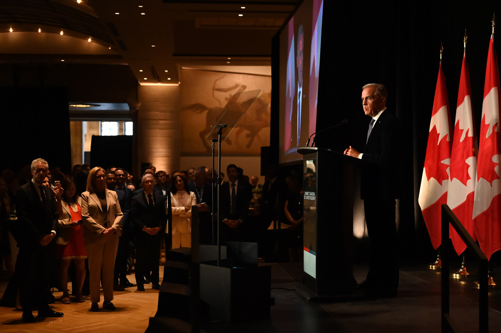 Canadian Prime Minister Mark Carney speaks to Canadian business leaders at the Canada Investment Summit welcome reception in Toronto, Sunday, Sept. 13, 2026. (Jon Blacker/The Canadian Press via AP)