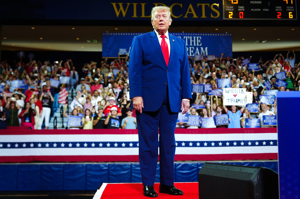 President Donald Trump arrives to speak at Wheeler High School, Wednesday, July 22, 2026, in Marietta, Ga. (AP Photo/Julia Demaree Nikhinson)