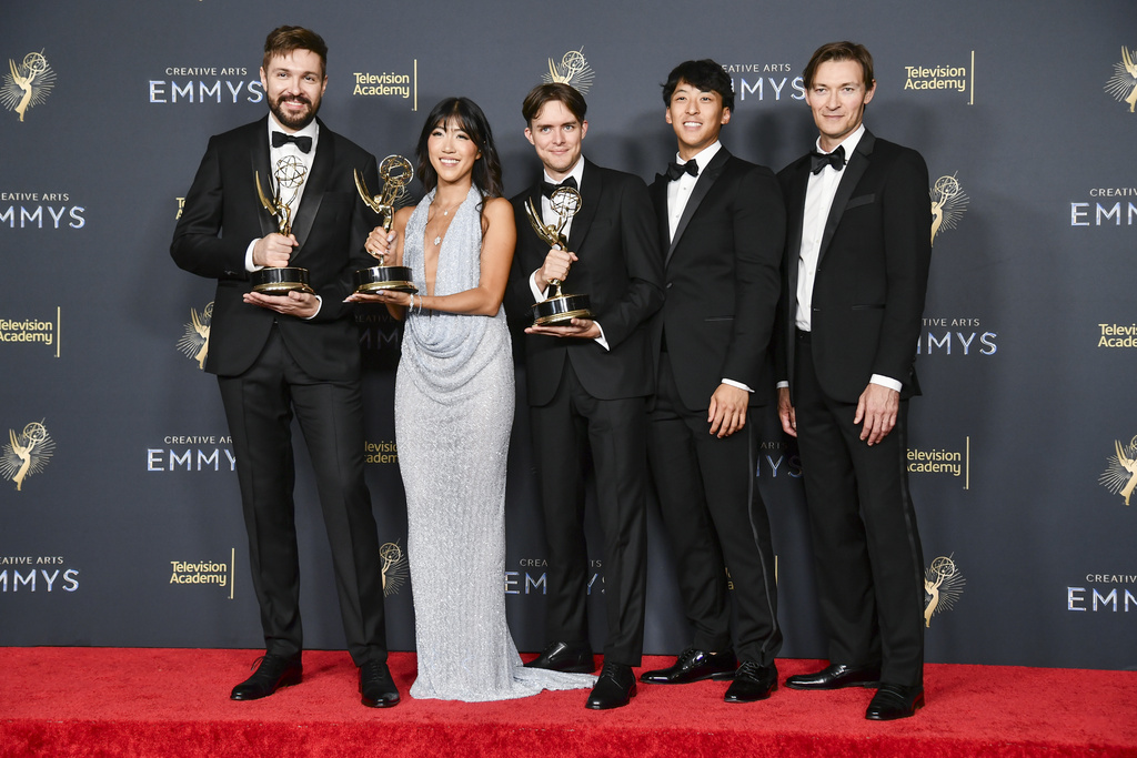 The team from "White Rabbit" pose in the press room with the award for outstanding innovation in emerging media programming during night two of the Creative Arts Emmy Awards on Sunday, Sept. 7, 2025, at the Peacock Theater in Los Angeles. (Photo by Richard Shotwell/Invision/AP)