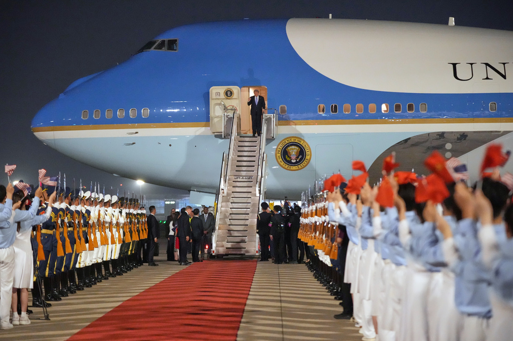 The Latest: Trump arrives in China to meet with Xi in Beijing | Bay to ...