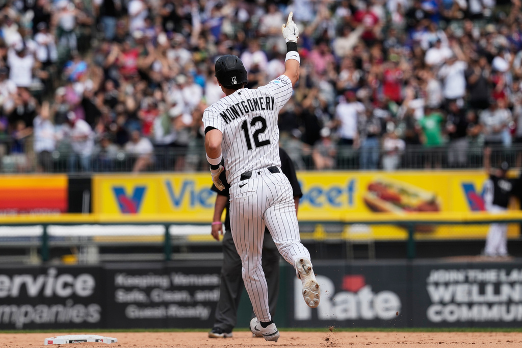 Chicago White Sox's Colson Montgomery celebrates as he rounds the bases after hitting a solo home run during the seventh inning of a baseball game against the Detroit Tigers in Chicago, Sunday, May 31, 2026. (AP Photo/Nam Y. Huh)