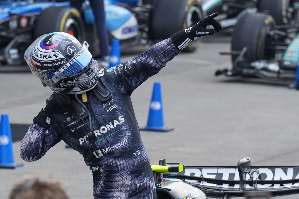 Mercedes driver Kimi Antonelli of Italy reacts after winning the Japanese Formula One Grand Prix at Suzuka in central Japan, Sunday, March 29, 2026. (AP Photo/Hiro Komae)