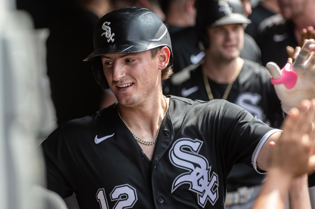 Chicago White Sox's Colson Montgomery is congratulated by teammates after hitting a two-run home run off Cleveland Guardians starting pitcher Tanner Bibee during the third inning of a baseball game, Sunday, July 5, 2026, in Cleveland. (AP Photo/Phil Long)