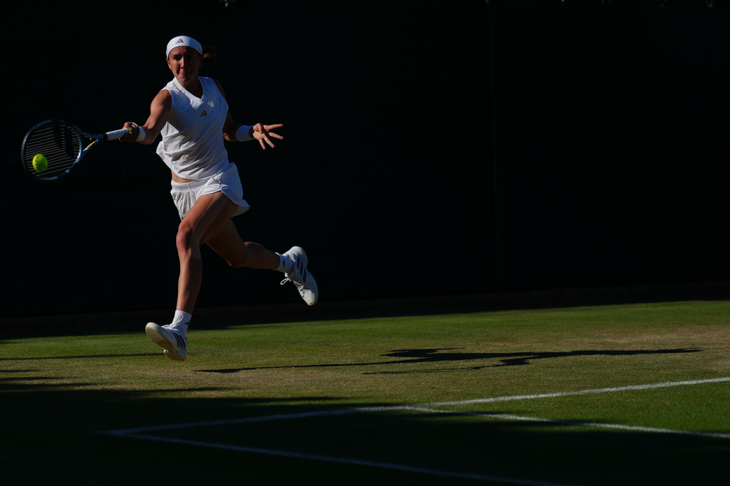 Nikola Bartunkova of Czech Republic returns the ball to Barbora Krejcikova of Czech Republic in their third round women's singles match at the Wimbledon Tennis Championships in London, Friday, July 3, 2026. (AP Photo/Kirsty Wigglesworth)