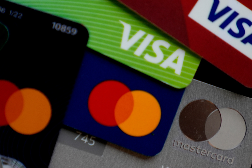 FILE - Visa and Mastercard credit cards are shown in Buffalo Grove, Ill., Feb. 8, 2024. (AP Photo/Nam Y. Huh, File)
