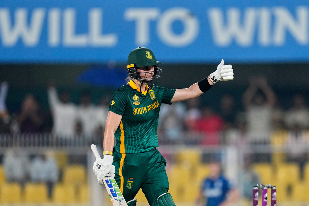 South Africa's captain Laura Wolvaardt celebrates one hundred and fifty runs during the ICC Women's Cricket World Cup first semifinal match between England and South Africa at Barsapara Cricket Stadium in Guwahati, India, Thursday, Oct. 29, 2025. (AP Photo/Anupam Nath)