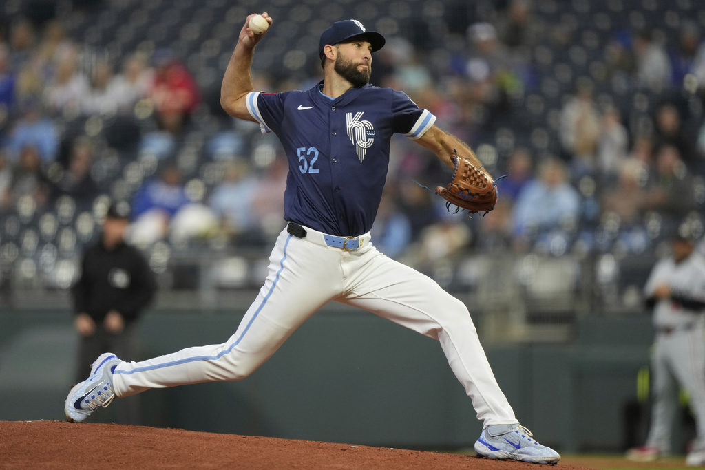 Kansas City Royals starting pitcher Michael Wacha throws during the first inning of a baseball game against the Minnesota Twins, Friday, Sept. 5, 2025, in Kansas City, Mo. (AP Photo/Charlie Riedel)