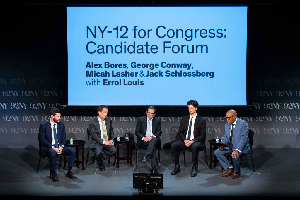 FILE - From left, Alex Bores, George Conway, Micah Lasher, and Jack Schlossberg, democratic candidates in New York's 12th Congressional District, and Errol Louis attend "NY-12 for Congress: Candidate Forum" at 92NY, on April 15, 2026, in New York. (AP Photo/Yuki Iwamura, File)