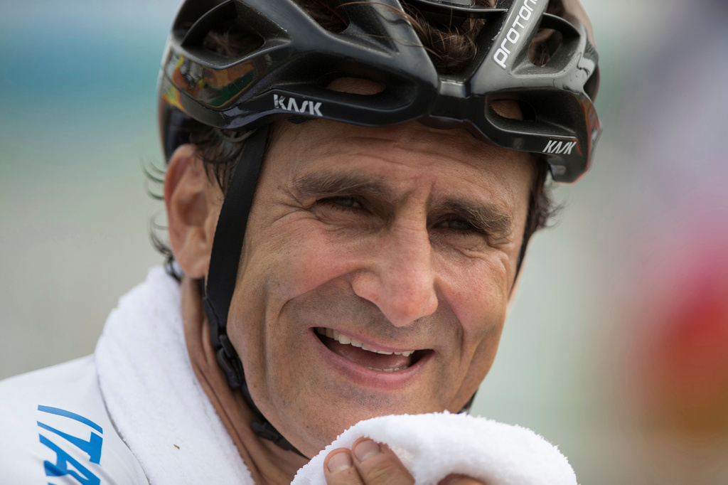 FILE - Alex Zanardi, smiles after winning the silver medal in the men's road race H5, during the 2016 Paralympics Games, in Rio de Janeiro, Brazil, Sept. 15, 2016, (AP Photo/Mauro Pimentel, File)