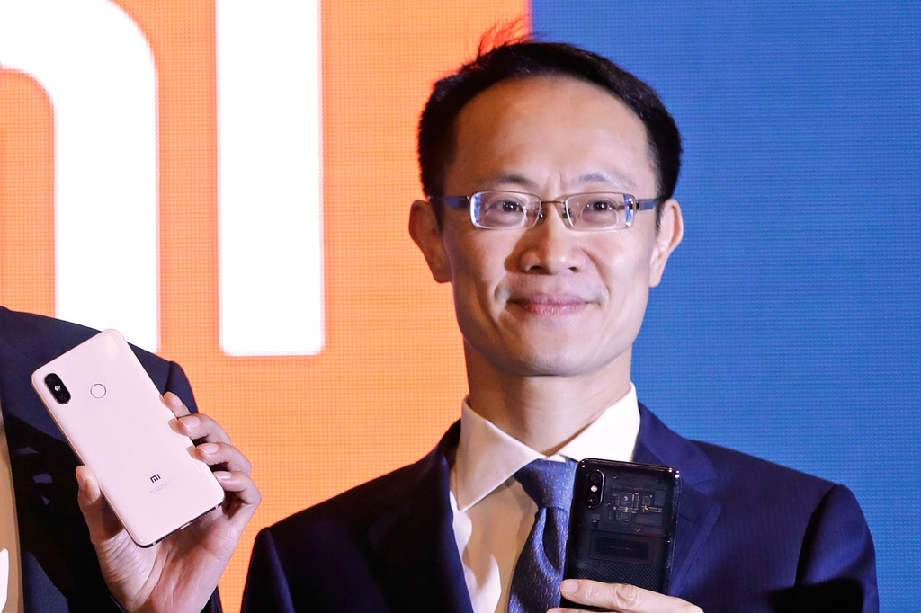FILE - Xiaomi Executive Director and President Lin Bin is seen at a news conference in Hong Kong on June 23, 2018. (AP Photo/Kin Cheung, File)