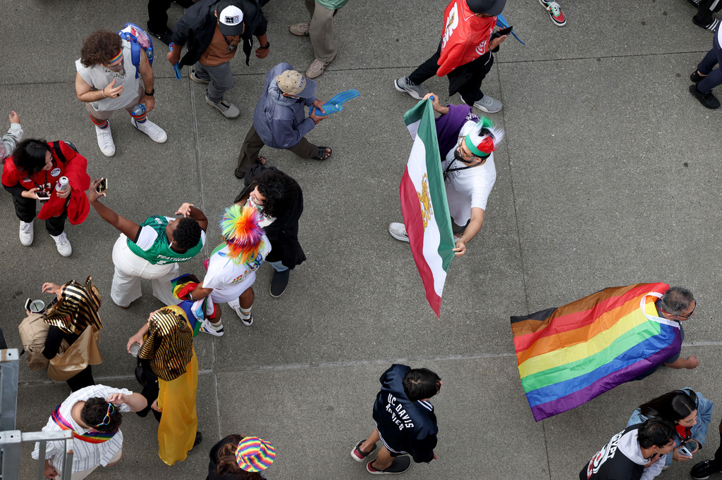 Fans arrive before the World Cup Group G soccer match between Egypt and Iran in Seattle, Friday, June 26, 2026. (AP Photo/Maddy Grassy)