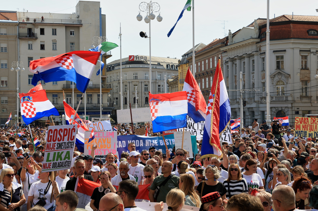 Thousands of people rally in protest over the discovery of illegally imported and disposed waste, including hazardous and toxic materials, in downtown Zagreb, Croatia, Saturday, Sept. 5, 2026. (AP Photo)