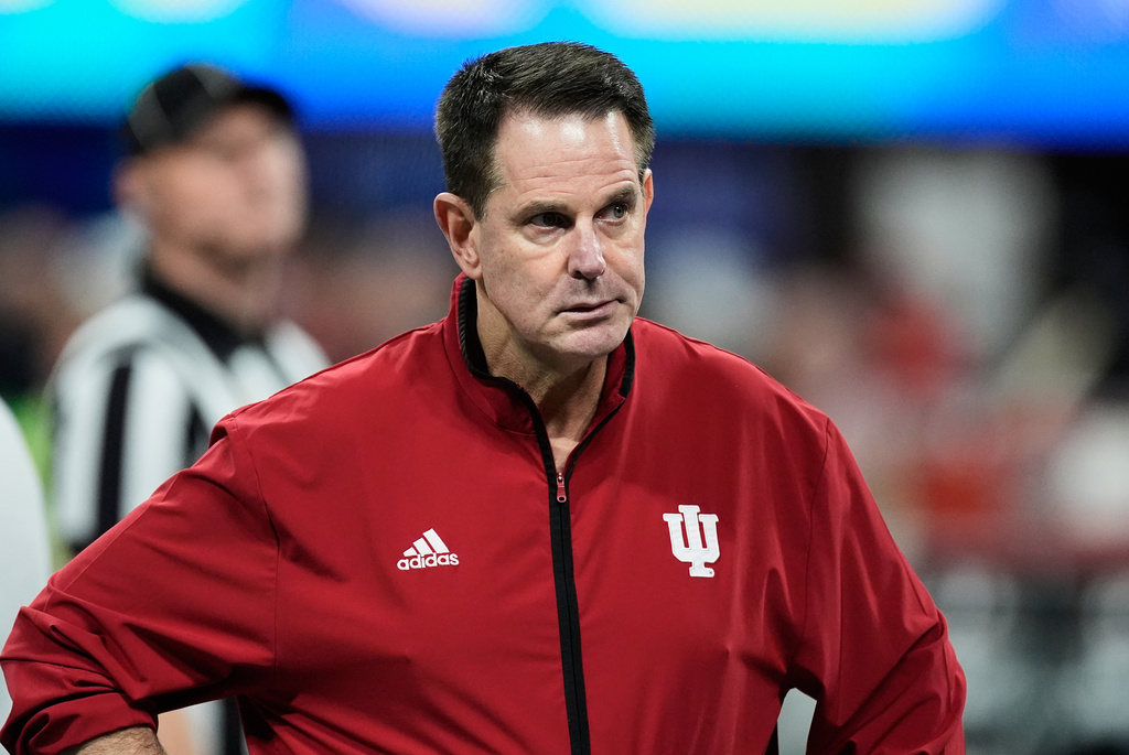 Indiana head coach Curt Cignetti walks on the field before the Peach Bowl NCAA college football playoff semifinal against Oregon, Friday, Jan. 9, 2026, in Atlanta. (AP Photo/Mike Stewart)