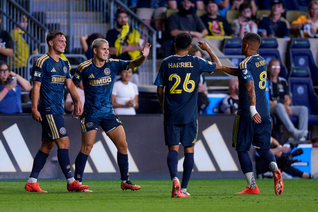 Philadelphia Union's Cavan Sullivan, second from left, celebrates after his goal with Nathan Harriel (26), Jesus Bueno (8) and Kai Wagner, left, during the second half of an MLS soccer match against CF Montreal, Saturday, Sept. 5, 2026, in Chester, Pa. (AP Photo/Chris Szagola)