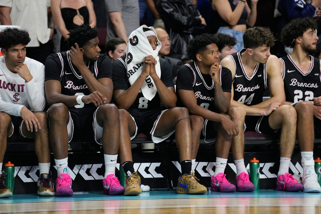 Santa Clara players sit on the bench as they trail Gonzaga during the second half of an NCAA college basketball final game in the West Coast Conference men's tournament Tuesday, March 10, 2026, in Las Vegas. (AP Photo/John Locher)