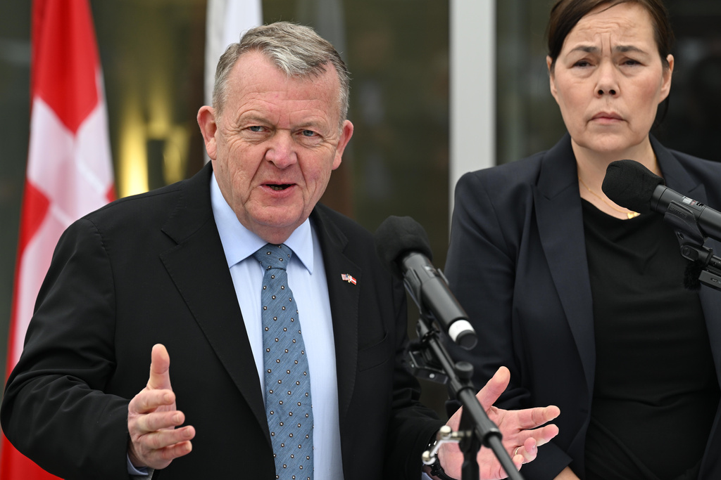 Denmark's Foreign Minister Lars Løkke Rasmussen and Greenland's Foreign Minister Vivian Motzfeldt speak at a news conference at the Embassy of Denmark, Wednesday, Jan. 14, 2026, in Washington. (AP Photo/John McDonnell)