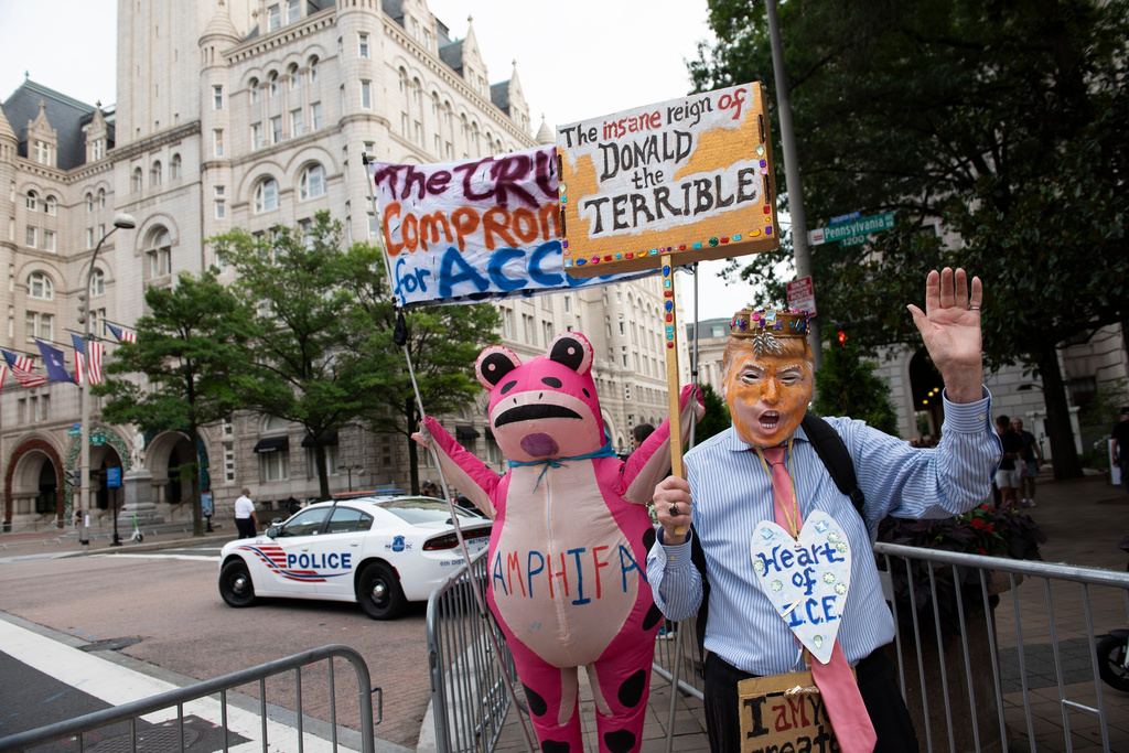 Demonstrators protest outside of the White House Correspondents' Association dinner at the Waldorf Astoria Washington DC hotel, in Washington, Friday, July 24, 2026. (AP Photo/Cliff Owen)