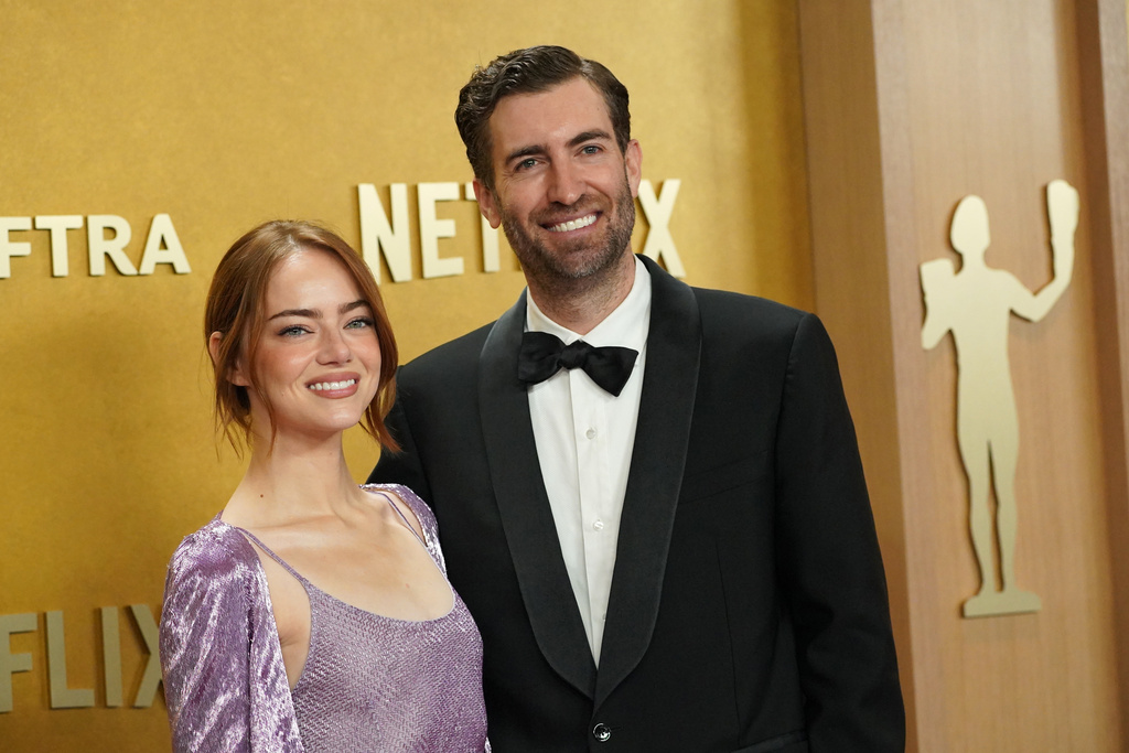 Emma Stone, left, and Dave McCary arrive at the 32nd Annual Actor Awards on Sunday, March 1, 2026, at the Shrine Auditorium and Expo Hall in Los Angeles. (Photo by Jordan Strauss/Invision/AP)