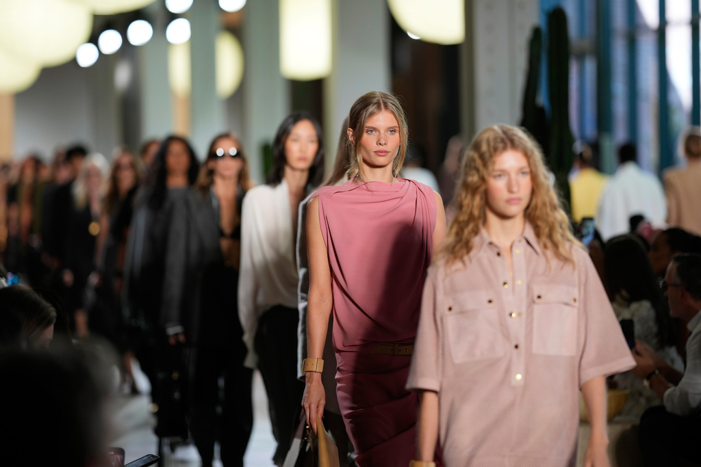 Models walk the runway during the Michael Kors Spring/Summer 2026 fashion show as part of New York Fashion Week on Thursday, Sept. 11, 2025, in New York. (Photo by Charles Sykes/Invision/AP)