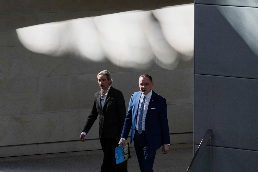 FILE - AfD Co-leaders Alice Weidel, left, and Tino Chrupalla attend a session of the German parliament in Berlin, Germany, March 18, 2026. (AP Photo/Markus Schreiber, File)