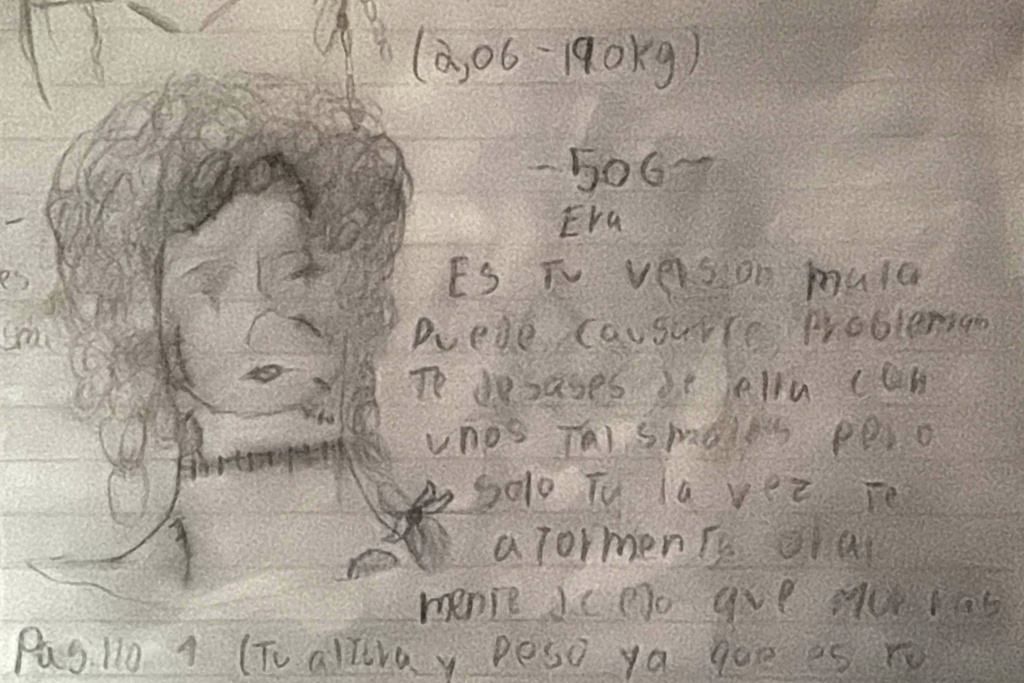 This image provided by the family in February 2026 shows a drawing made by a 13-year-old Colombian girl when she was detained at South Texas Family Residential Center in Dilley, Texas, where the Trump administration is holding immigrant families. (AP Photo)
