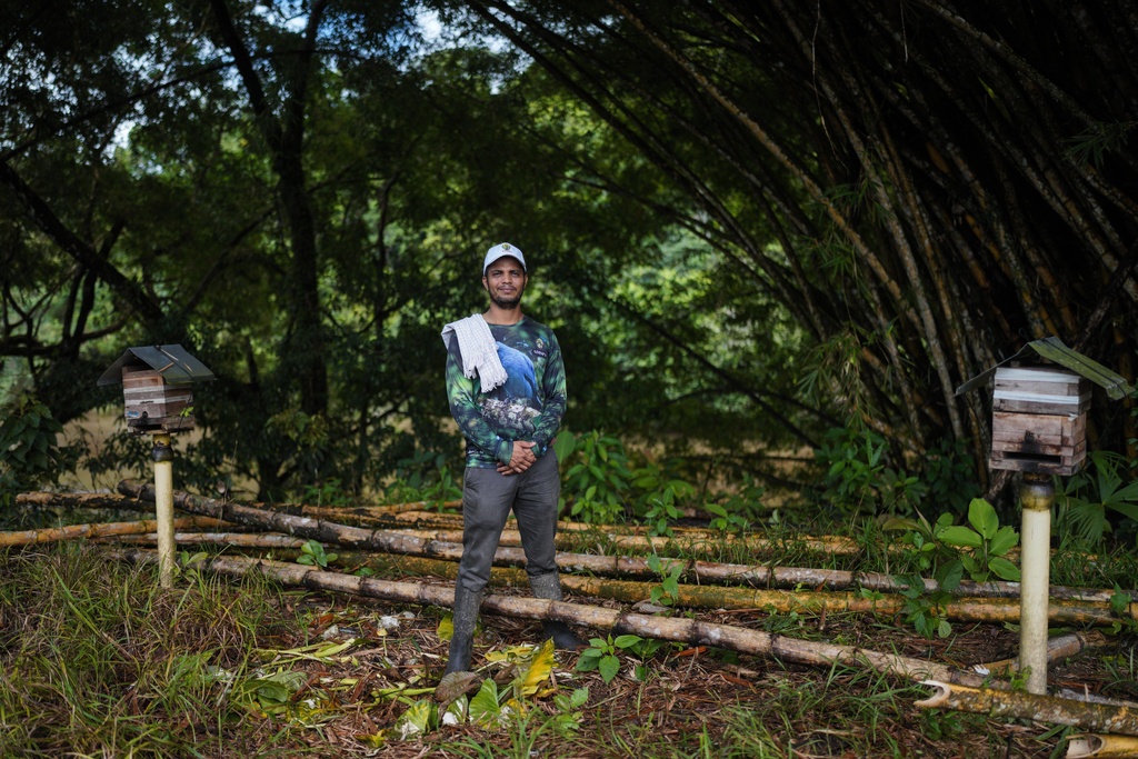 Ruben Pastrana poses for a photo on the outskirts of Puerto Asis, Colombia, Wednesday, Nov. 26, 2025. (AP Photo/Ivan Valencia)
