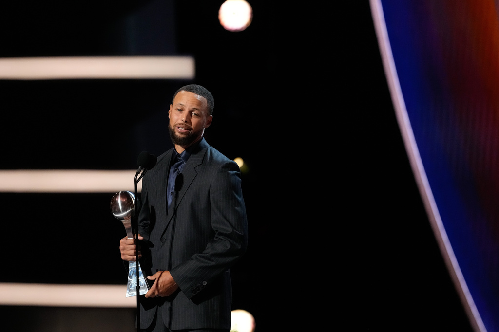Basketball player Stephen Curry accepts the Muhammad Ali Sports Humanitarian Award at the ESPY Awards in the David H. Koch Theater at Lincoln Center Wednesday, July 15, 2026, in New York. (AP Photo/Frank Franklin II)