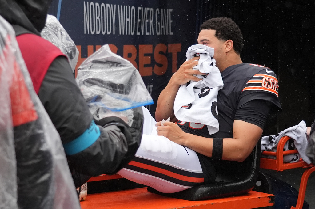 Chicago Bears quarterback Caleb Williams is carted off the field after an injury during the second half of an NFL football game against the Minnesota Vikings in Chicago, Sunday, Sept. 20, 2026. (AP Photo/Nam Y. Huh)