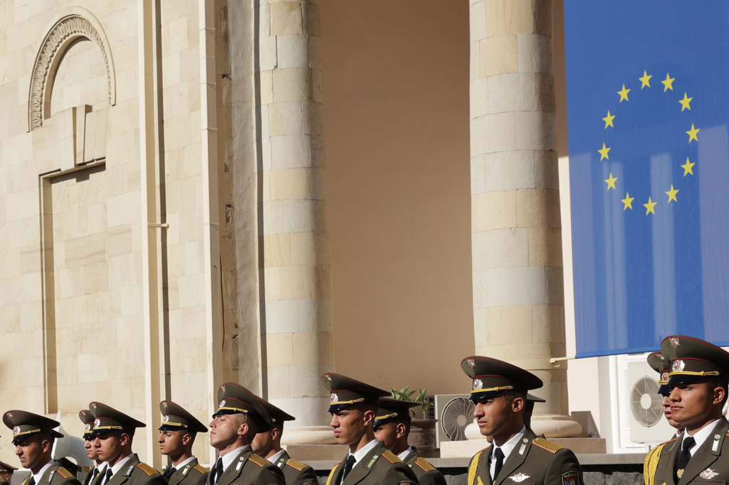 Soldiers stand in formation during an official arrival ceremony for the EU-Armenia summit at the Presidential Palace in Yerevan, Armenia, Tuesday, May 5, 2026. (AP Photo/Anthony Pizzoferrato)