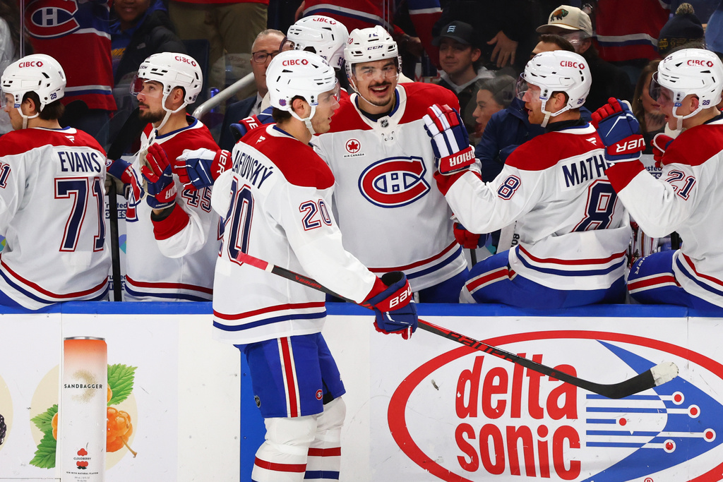 Montréal Canadiens left wing Juraj Slafkovský (20) celebrates his goal during the first period of an NHL hockey game against the Buffalo Sabres Saturday, Jan. 31, 2026, in Buffalo, N.Y. (AP Photo/Jeffrey T. Barnes)