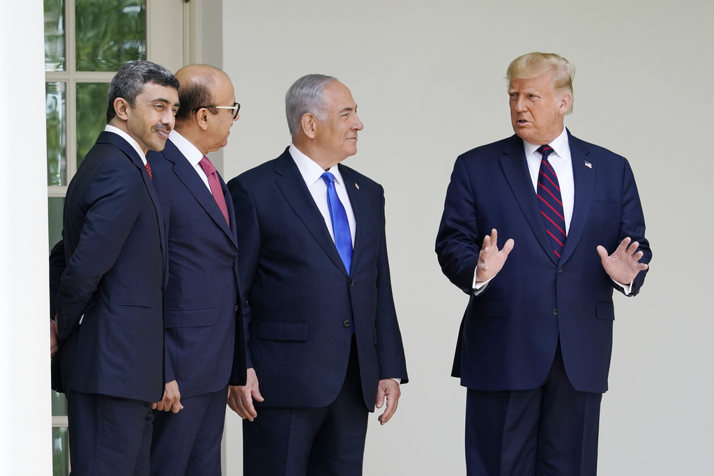 FILE - President Donald Trump, far right, walks to the Abraham Accords signing ceremony, from left, United Arab Emirates Foreign Minister Abdullah bin Zayed Al Nahyan, Bahrain Foreign Minister Khalid bin Ahmed Al Khalifa and Israeli Prime Minister Benjamin Netanyahu at the White House on Sept. 15, 2020, in Washington. (AP Photo/Alex Brandon, File)