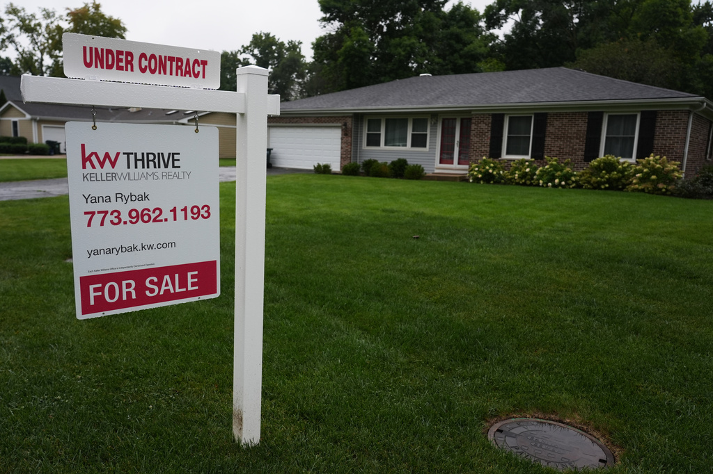 FILE - For sale sign is seen outside of a home in Arlington Heights, Ill., Wednesday, Sept. 16, 2026. (AP Photo/Nam Y. Huh, File)