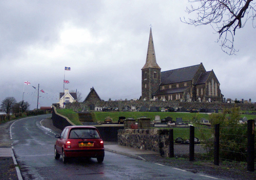 FILE - The often barricaded Protestant church of Drumcree stands alone near the town of Portadown, Thursday, Dec. 2, 1999. (AP Photo/Adam Butler, File)