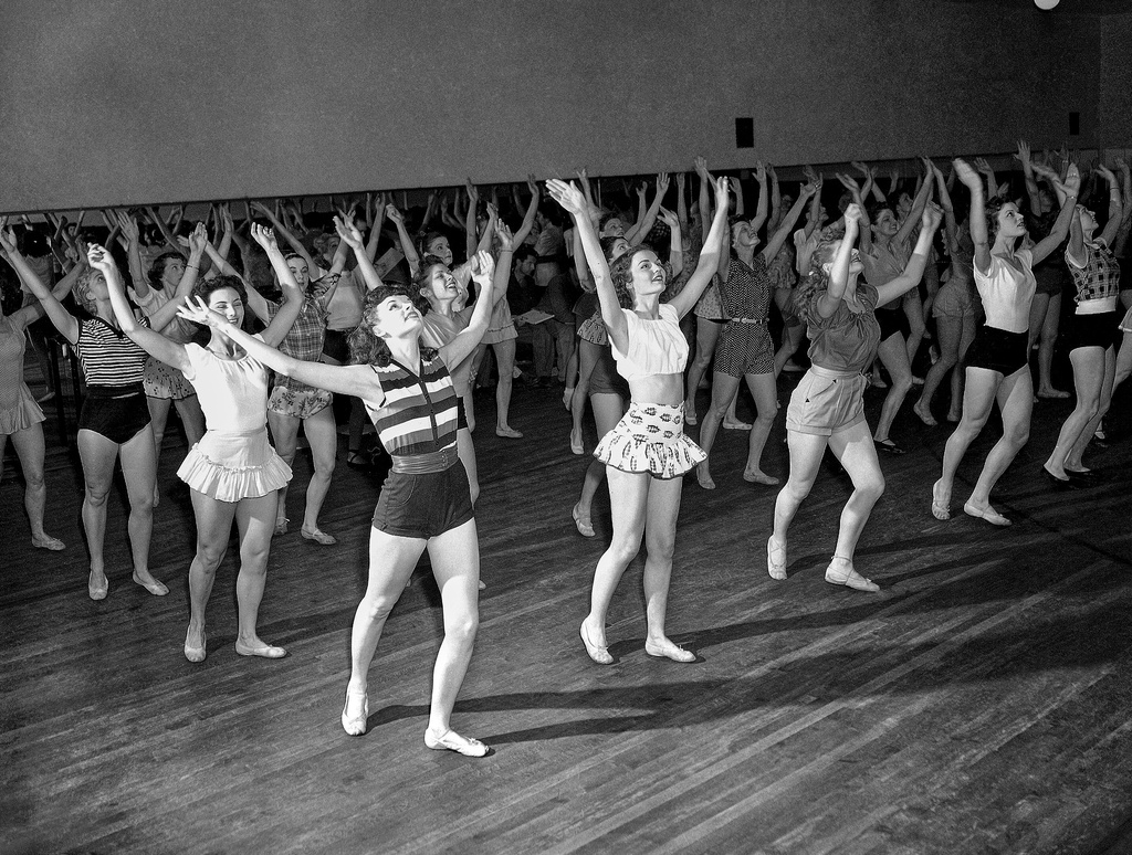 FILE — Radio City Music Hall Rockettes, Corliss Fyfe, Eleanor Dunne, Ginnie Volmer and Pat White, rehearse on June 13, 1951, in New York. (AP Photo/Dan Grossi, File)