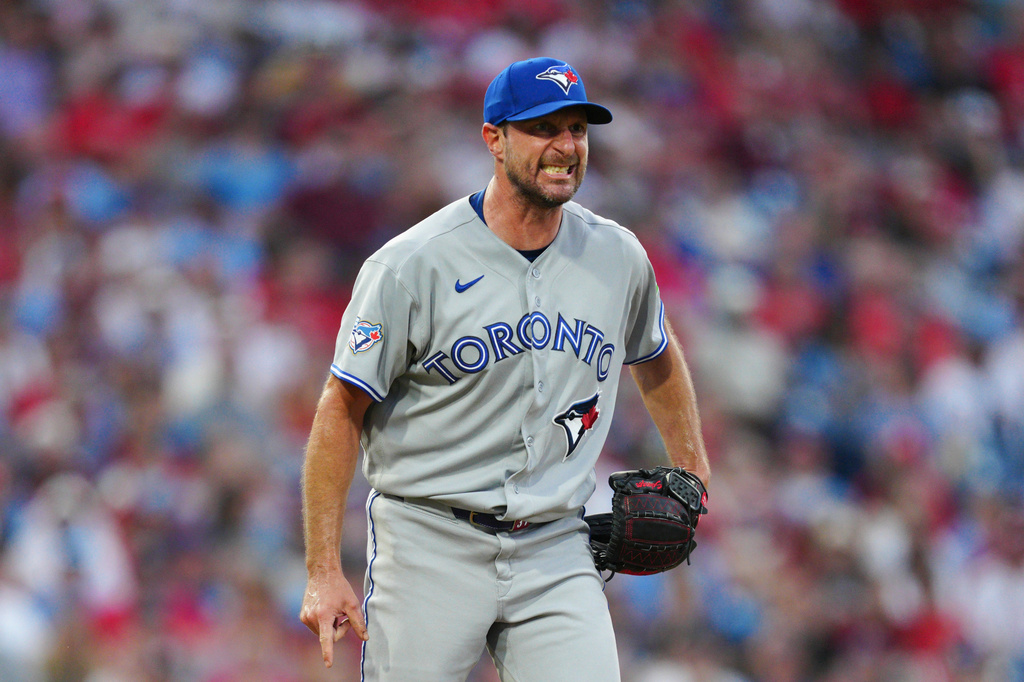 Toronto Blue Jays pitcher Max Scherzer reacts after a strike out against Philadelphia Phillies' Bryan de la Cruz during the fifth inning of a baseball game, Saturday, Aug. 8, 2026, in Philadelphia. (AP Photo/Derik Hamilton)