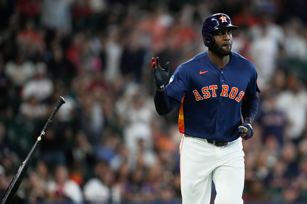 Houston Astros designated hitter Yordan Alvarez celebrates as he runs the bases after hitting a home run during the eighth inning of a baseball game against the St. Louis Cardinals in Houston, Sunday, April 19, 2026. (AP Photo/Ashley Landis)