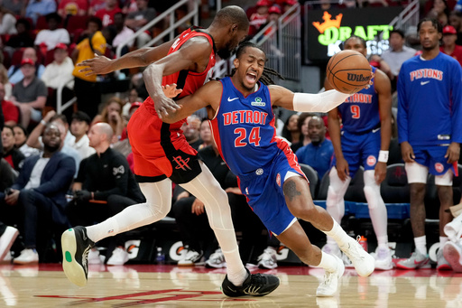 Detroit Pistons guard Daniss Jenkins (24) works against Houston Rockets forward Kevin Durant during the first half of an NBA basketball game Friday, Oct. 24, 2025, in Houston. (AP Photo/Eric Christian Smith) Detroit Pistons guard Daniss Jenkins (24) works against Houston Rockets forward Kevin Durant during the first half of an NBA basketball game Friday, Oct. 24, 2025, in Houston. (AP Photo/Eric Christian Smith)