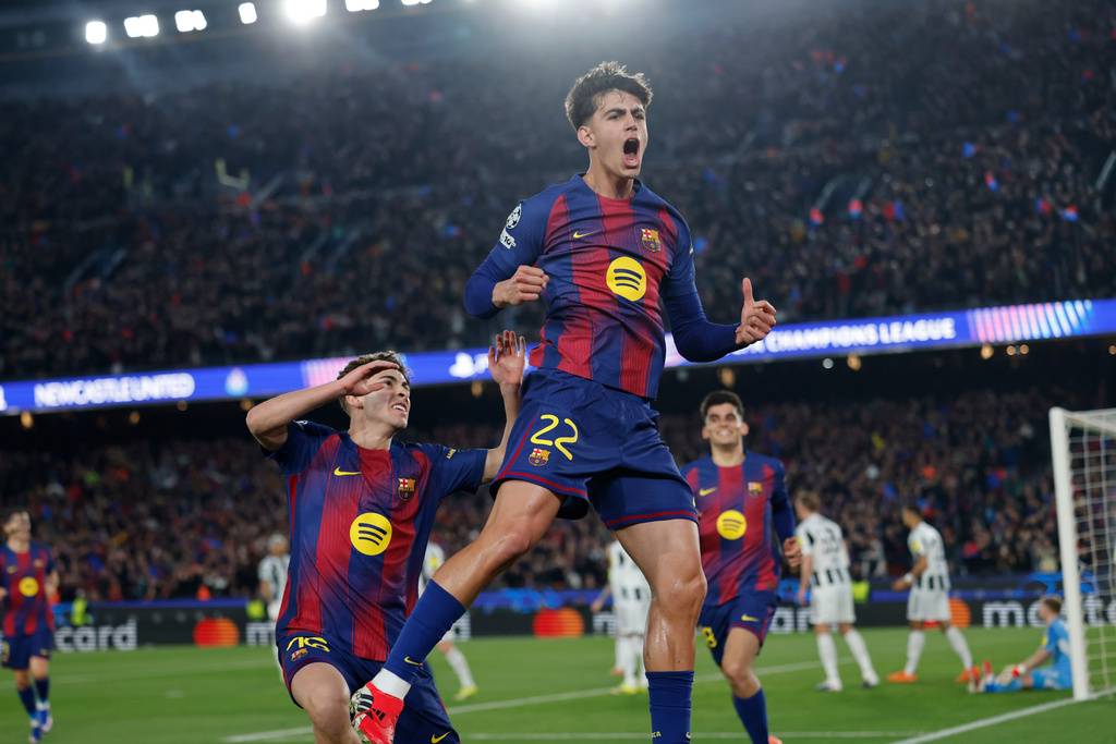 Barcelona's Marc Bernal celebrates after scoring his side's second goal during the Champions League round of 16, second leg soccer match between FC Barcelona and Newcastle United FC in Barcelona, Spain, Wednesday, March 18, 2026. (AP Photo/Joan Monfort)