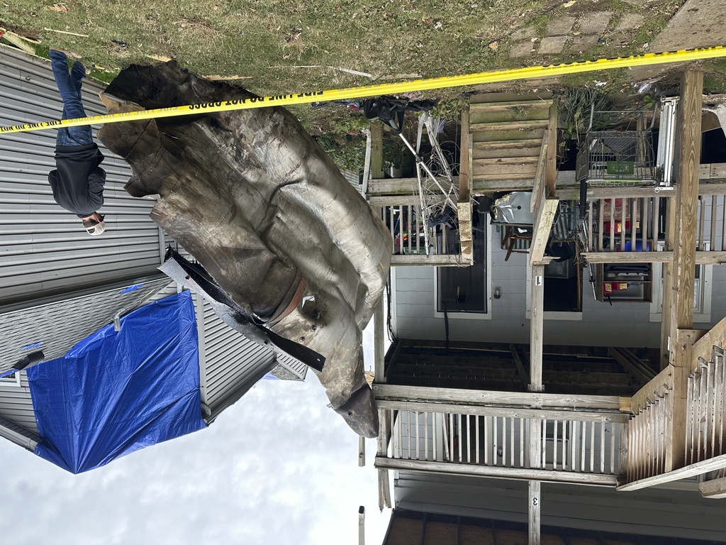 A massive piece of debris that flew from the Givaudan Color Sense plant after an explosion is pictured on Wednesday, Nov. 13, 2024 in Louisville, Ky. (AP Photo/Dylan Lovan)